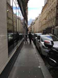 Dyson and Tracy walking the streets of Paris.